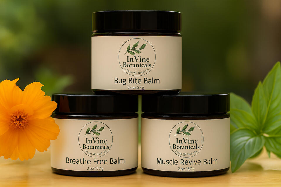 InVine Botanicals trio of handcrafted herbal balms in amber jars with logo and tagline